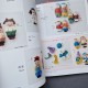 Японська книга "100 вʼязаних ляльок"